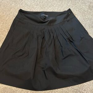 Pleated black skirt. Pockets!